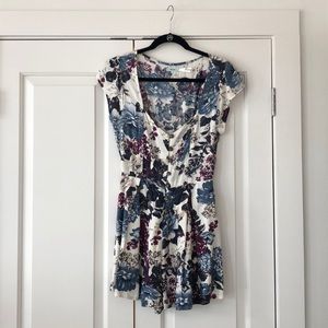 90s inspired floral romper from Urban Outfitters